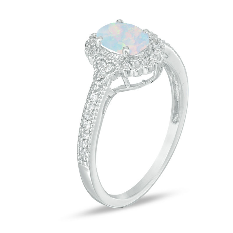 Oval Lab-Created Opal and 1/8 CT. T.W. Diamond Frame Vintage-Style Ring in 10K White Gold