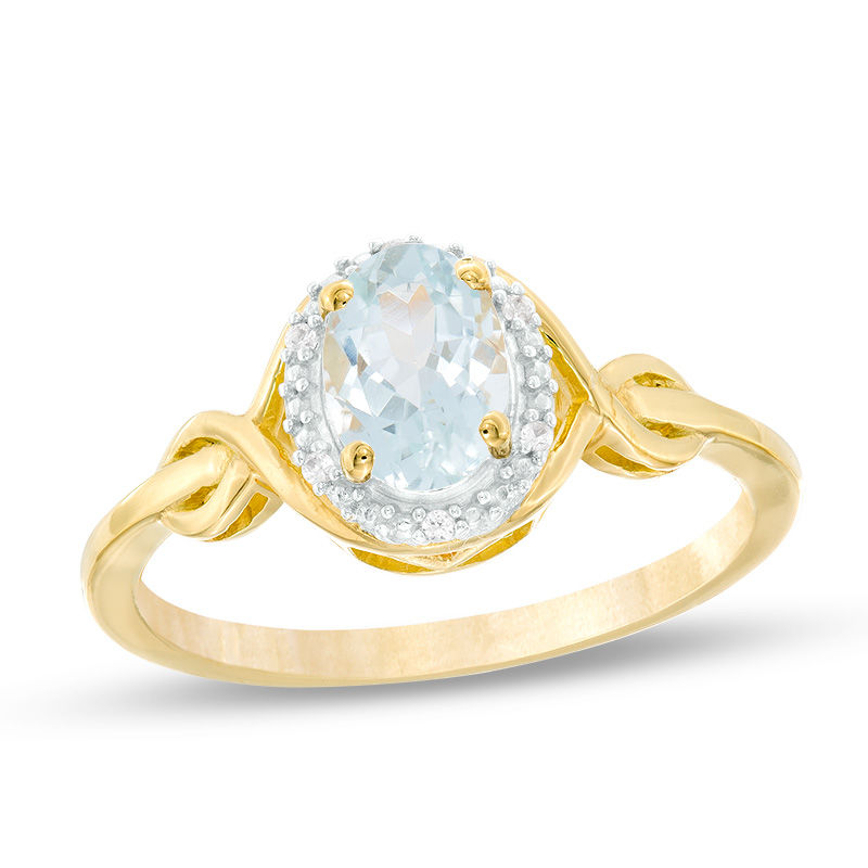 Main Image 1 of Oval Aquamarine and Diamond Accent Twist Ring in 10K Gold