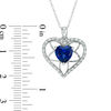 Thumbnail Image 1 of 7.0mm Heart-Shaped Lab-Created Blue Sapphire and 1/8 CT. T.W. Diamond Floral Heart Pendant in 10K White Gold