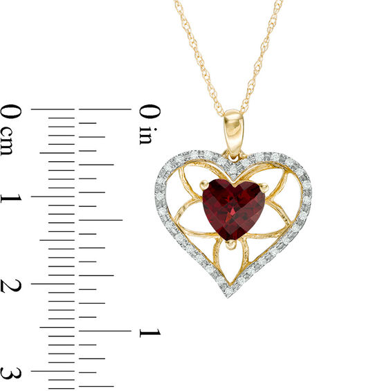 7.0mm Heart-Shaped Garnet and 1/8 CT. T.w. Diamond Floral Heart Pendant in 10K Gold