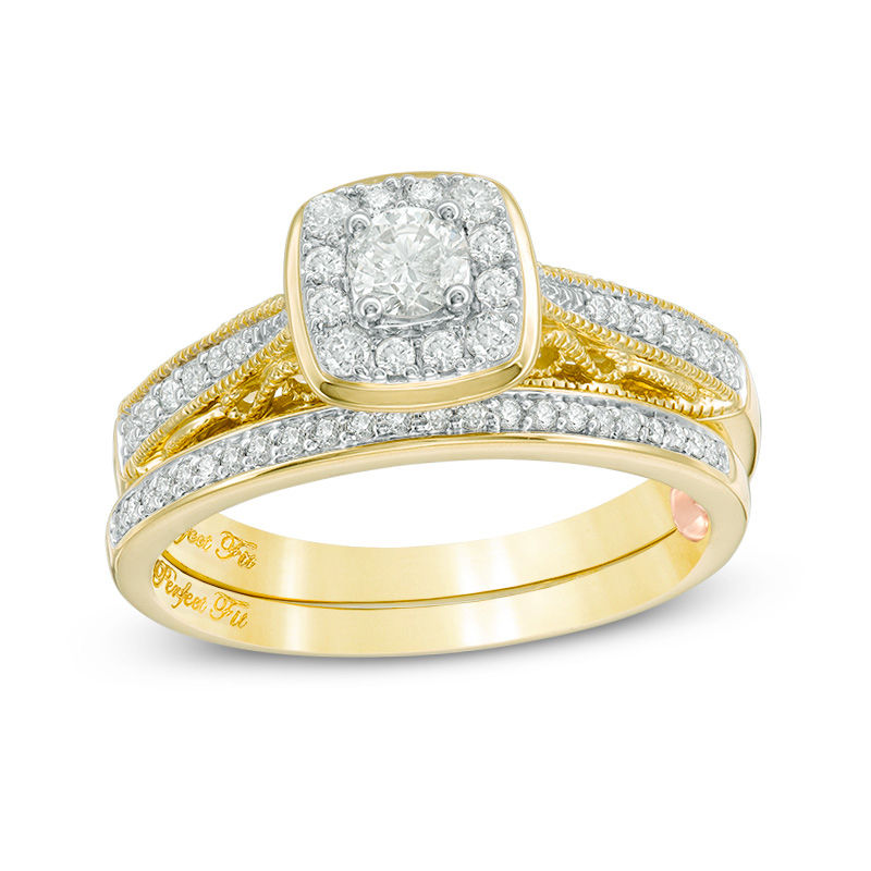 Main Image 1 of 1/2 CT. T.W. Diamond Cushion Frame Vintage-Style Interlocking Bridal Set in 10K Gold