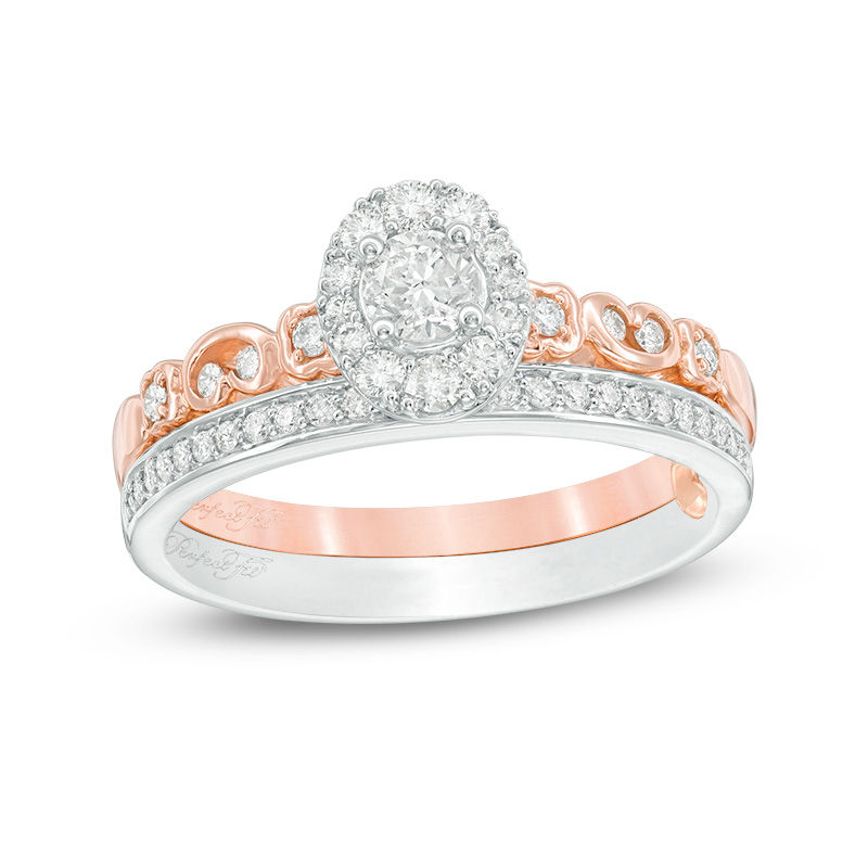 Main Image 1 of 1/2 CT. T.W. Diamond Oval Frame Interlocking Bridal Set in 10K Two-Tone Gold