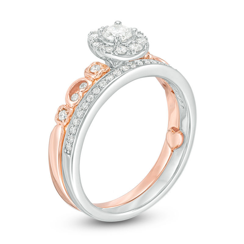 Main Image 2 of 1/2 CT. T.W. Diamond Oval Frame Interlocking Bridal Set in 10K Two-Tone Gold