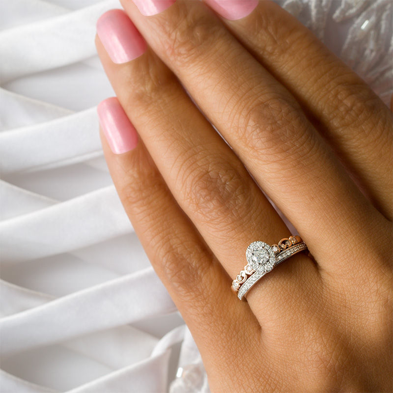 Main Image 3 of 1/2 CT. T.W. Diamond Oval Frame Interlocking Bridal Set in 10K Two-Tone Gold