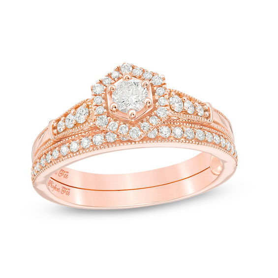 1/2 CT. T.w. Diamond Hexagon Frame Vintage-Style Interlocking Bridal Set in 10K Rose Gold