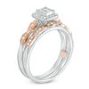 Thumbnail Image 1 of 1/3 CT. T.W. Quad Princess-Cut Diamond Frame Interlocking Bridal Set in 10K Two-Tone Gold