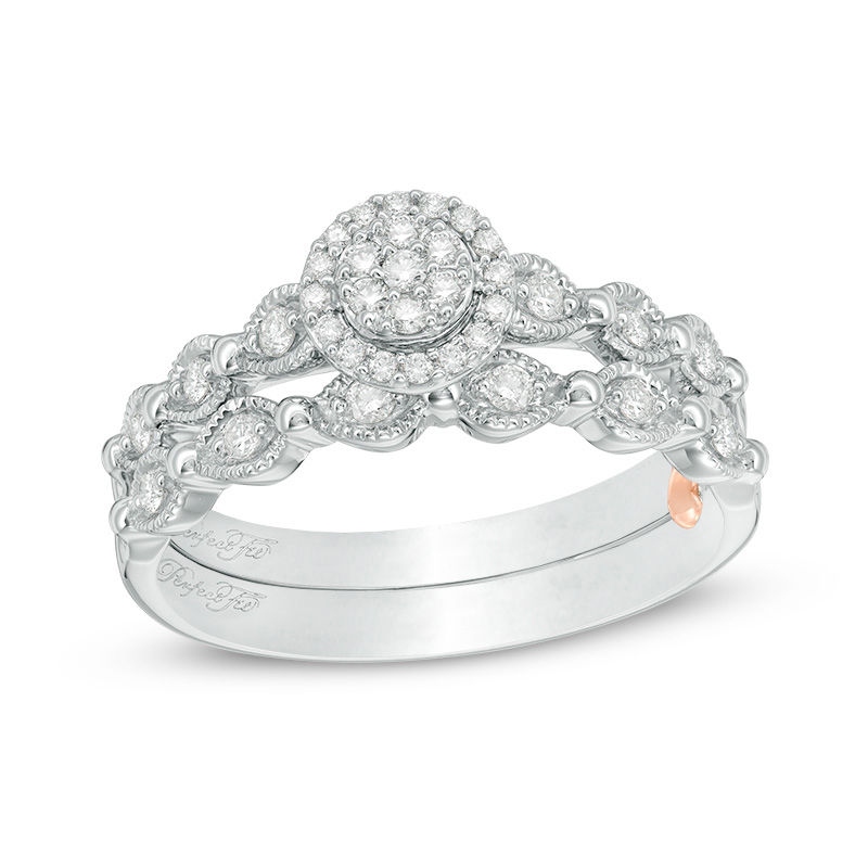 Main Image 1 of 1/4 CT. T.W. Composite Diamond Frame Vintage-Style Interlocking Bridal Set in 10K White Gold