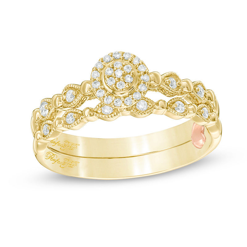 Main Image 1 of 1/6 CT. T.W. Composite Diamond Frame Vintage-Style Interlocking Bridal Set in 10K Gold