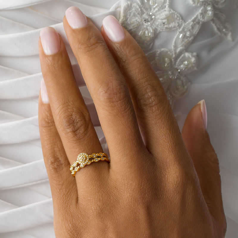 Main Image 3 of 1/6 CT. T.W. Composite Diamond Frame Vintage-Style Interlocking Bridal Set in 10K Gold