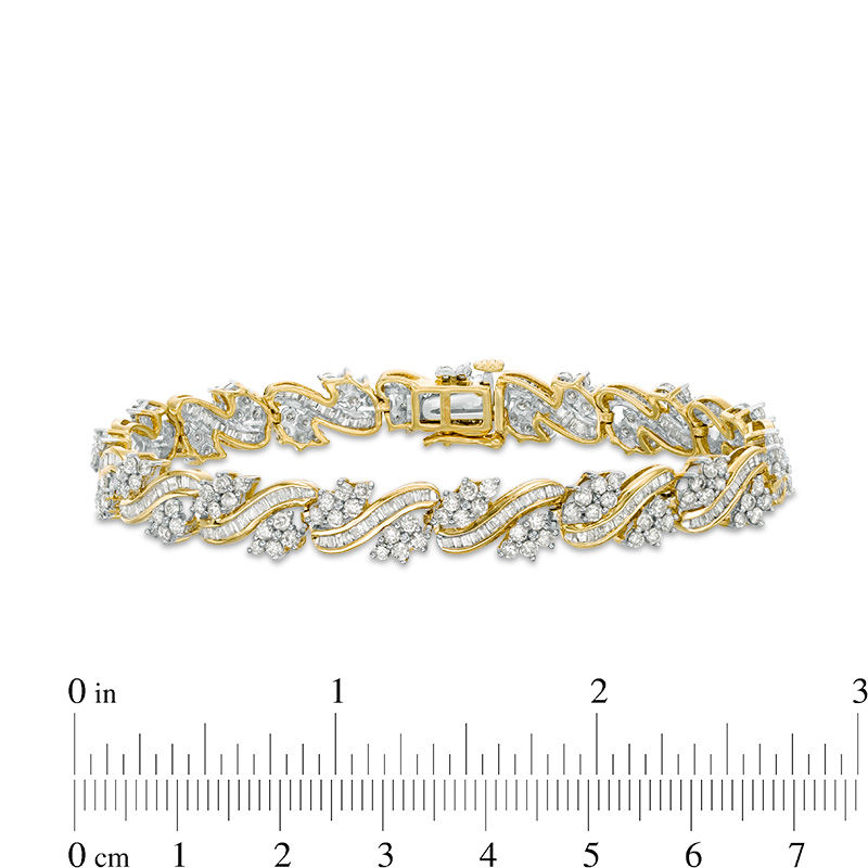 5 CT. T.W. Baguette and Round Diamond Wave Bracelet in 10K Gold - 7.25"