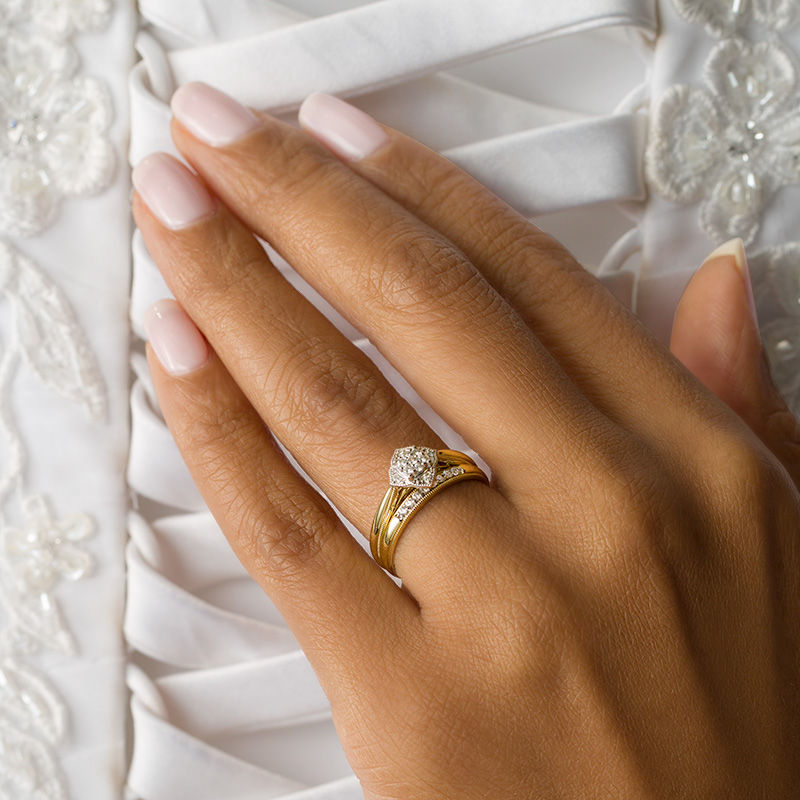Main Image 3 of 1/6 CT. T.W. Composite Diamond Flower Vintage-Style Interlocking Bridal Set in 10K Gold