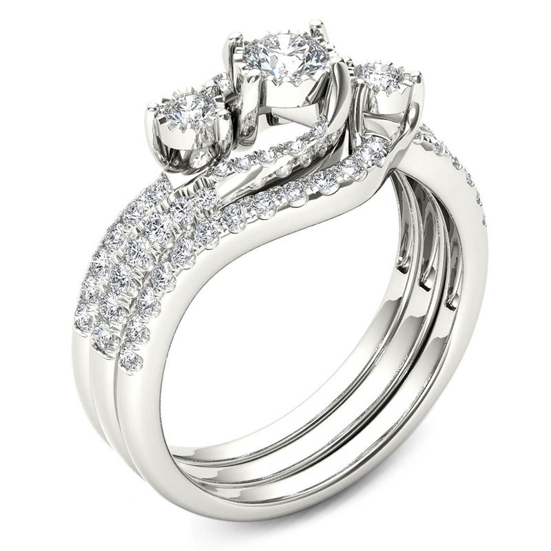 Main Image 2 of 3/4 CT. T.W. Diamond Three Stone Bypass Three Piece Bridal Set in 14K White Gold