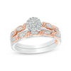 Thumbnail Image 1 of 1/10 CT. T.W. Composite Diamond Frame Twist Ribbon Interlocking Bridal Set in 10K Two-Tone Gold