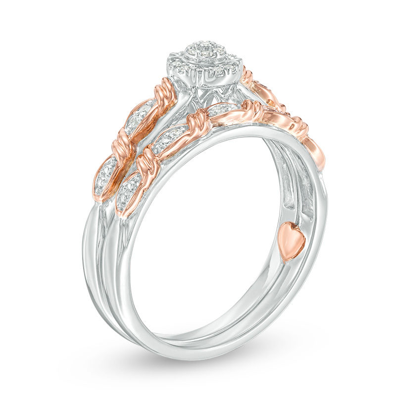 Main Image 2 of 1/10 CT. T.W. Composite Diamond Frame Twist Ribbon Interlocking Bridal Set in 10K Two-Tone Gold