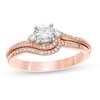 Thumbnail Image 1 of 1/4 CT. T.W. Diamond Bypass Three Stone Bridal Set in 10K Rose Gold