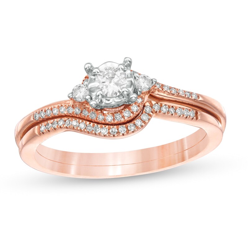 Main Image 1 of 1/4 CT. T.W. Diamond Bypass Three Stone Bridal Set in 10K Rose Gold