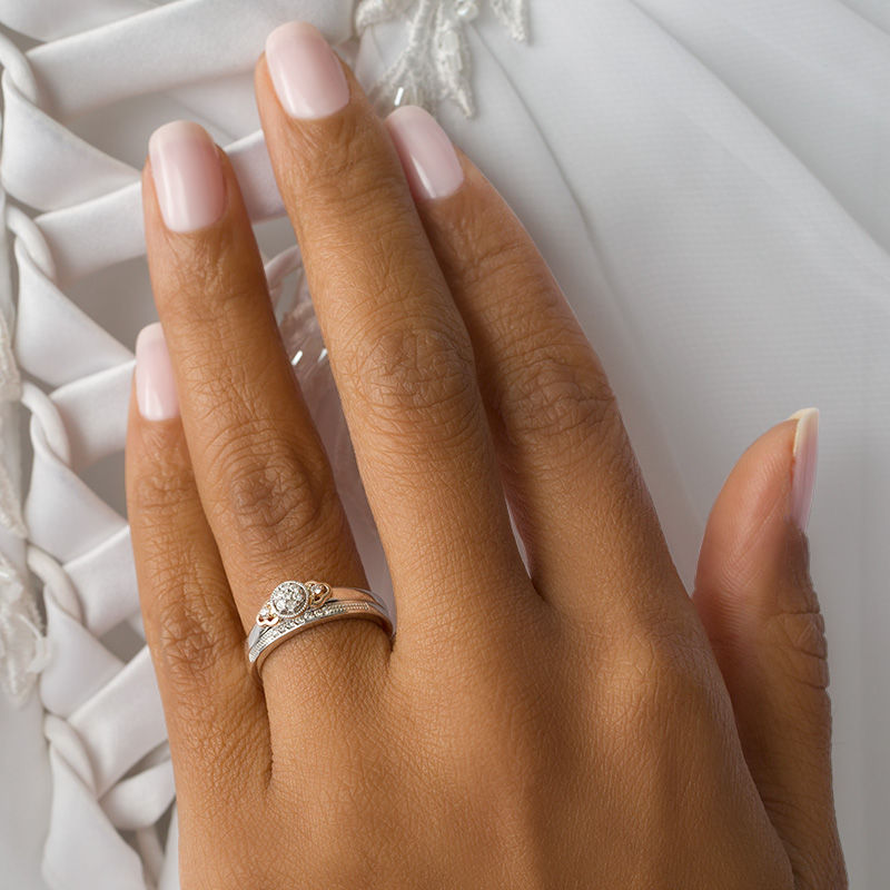 Main Image 3 of 1/8 CT. T.W. Composite Diamond Flower-Sides Interlocking Bridal Set in 10K Two-Tone Gold