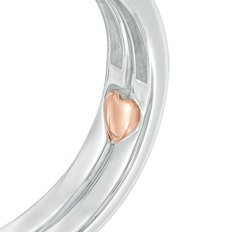 Main Image 4 of 1/8 CT. T.W. Composite Diamond Flower-Sides Interlocking Bridal Set in 10K Two-Tone Gold