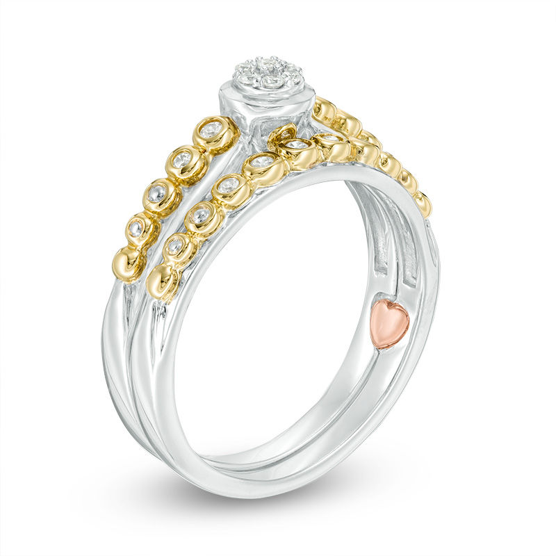1/8 CT. T.W. Composite Diamond Bubble Interlocking Bridal Set in 10K Two-Tone Gold