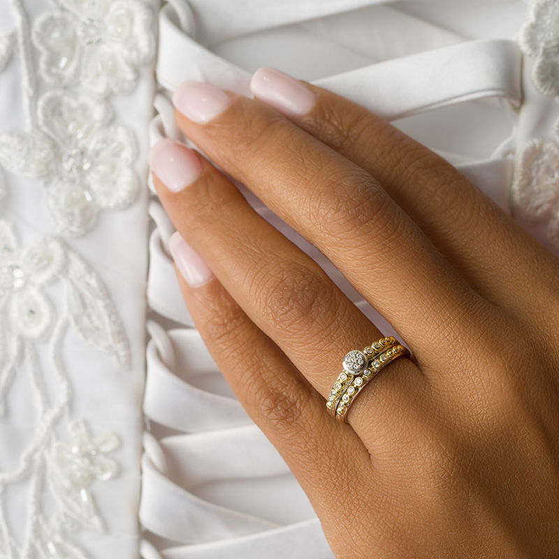 Main Image 3 of 1/8 CT. T.W. Composite Diamond Bubble Interlocking Bridal Set in 10K Two-Tone Gold