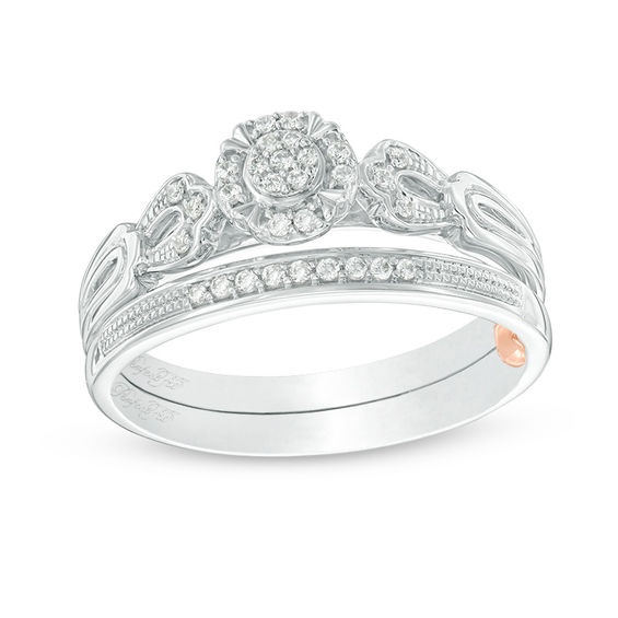 1/8 CT. T.w. Composite Diamond Frame Vintage-Style Interlocking Bridal Set in 10K White Gold