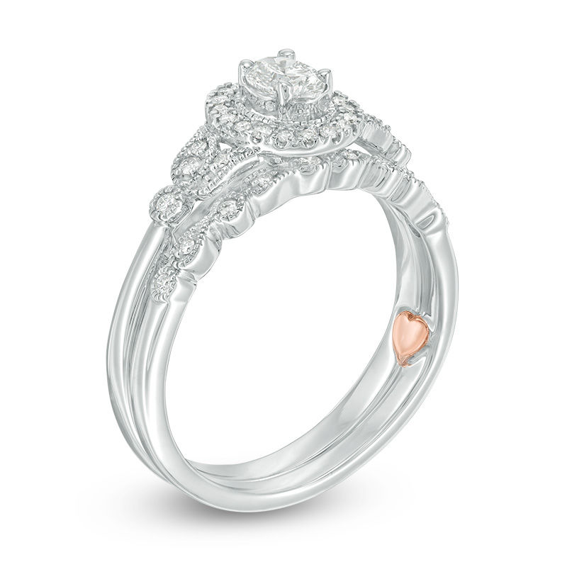 Main Image 2 of 1/2 CT. T.W. Oval Diamond Frame Vintage-Style Interlocking Bridal Set in 10K White Gold