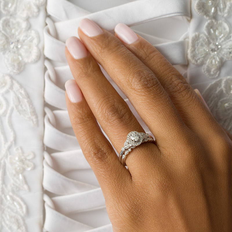 Main Image 3 of 1/2 CT. T.W. Oval Diamond Frame Vintage-Style Interlocking Bridal Set in 10K White Gold