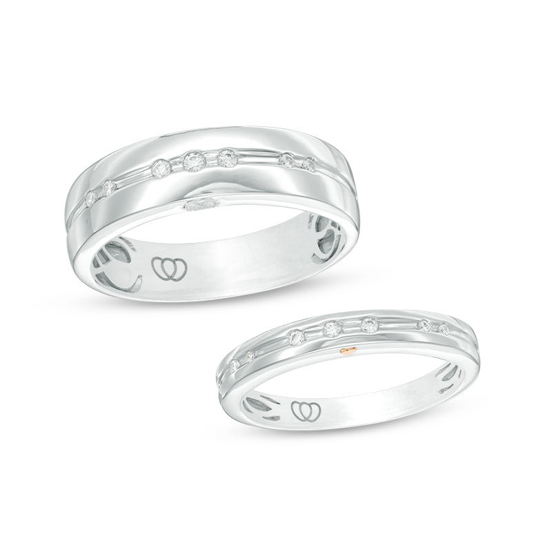 Main Image 1 of 1/8 CT. T.W. Diamond Duo Wedding Band Set in 10K White Gold - Size 7 and 10