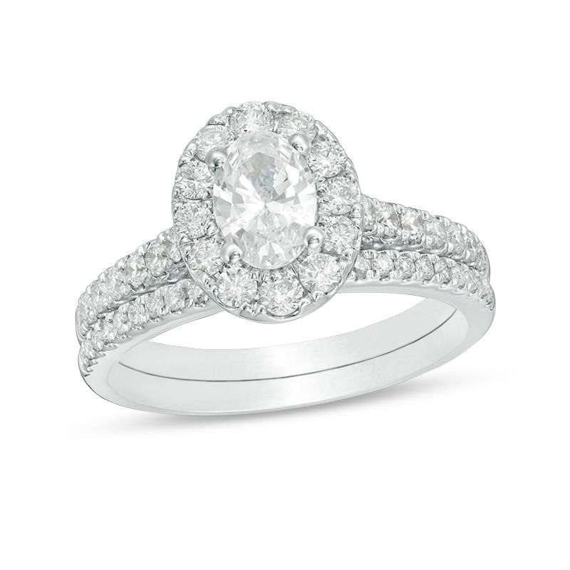 Celebration Ideal 1-1/2 CT. T.W. Oval Diamond Frame Bridal Set in 14K White Gold (I/I1)