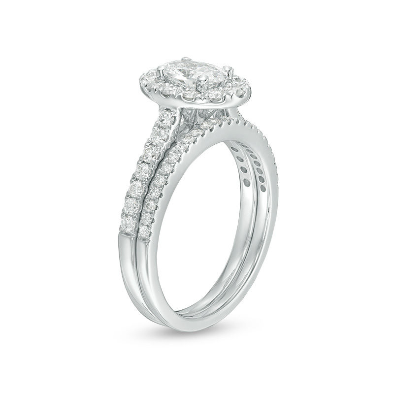 Celebration Ideal 1-1/2 CT. T.W. Oval Diamond Frame Bridal Set in 14K White Gold (I/I1)