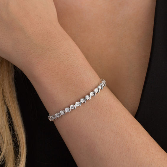 1/10 CT. T.w. Diamond "S" Tennis Bracelet in Sterling Silver - 7.25"