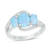 Thumbnail Image 1 of Oval Lab-Created Blue Opal and White Sapphire Three Stone Bypass Ring in Sterling Silver