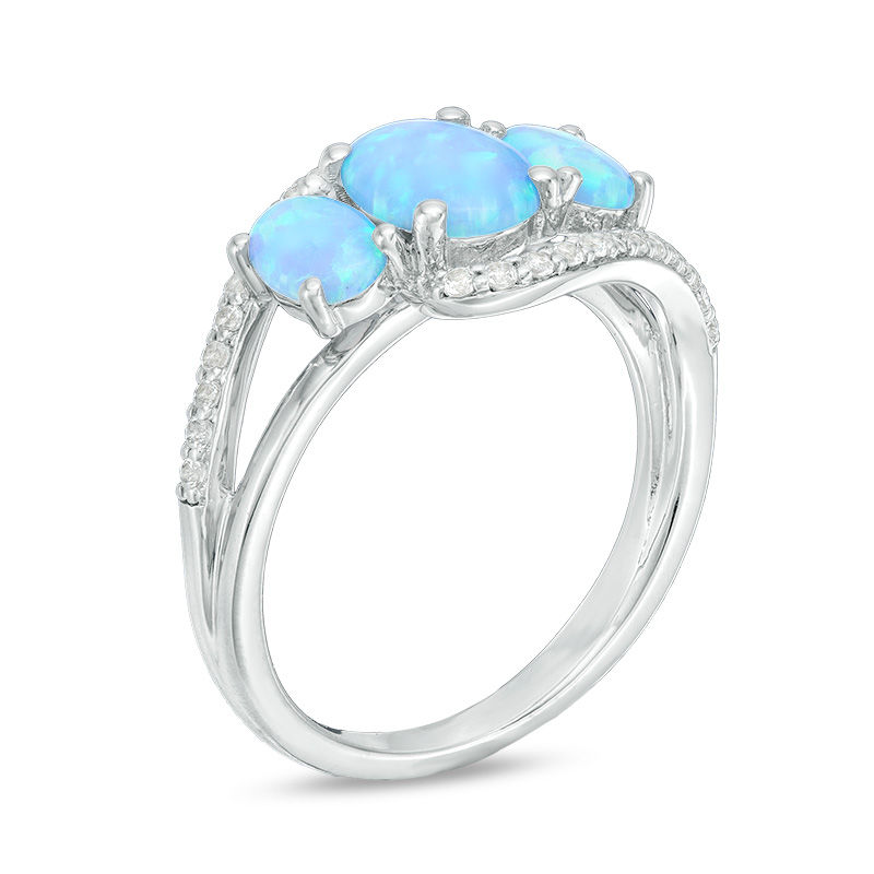 Main Image 2 of Oval Lab-Created Blue Opal and White Sapphire Three Stone Bypass Ring in Sterling Silver