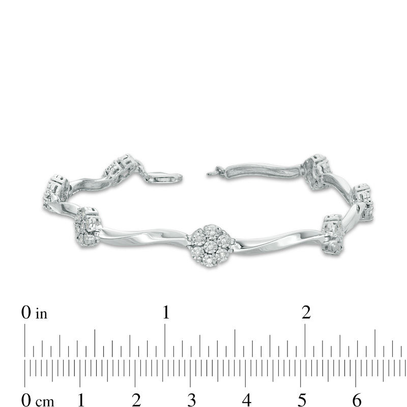 Zales 1/4 Ct. T.W. Diamond Flower Twist Bracelet in Sterling Silver - 7.25