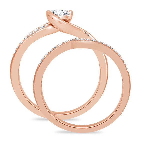 1/2 CT. T.w. Diamond Swirl Bypass Bridal Set in 10K Rose Gold