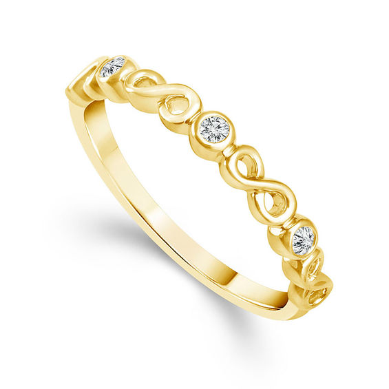 1/20 CT. T.w. Diamond Three Stone Alternating Infinity Stackable Band in 10K Gold