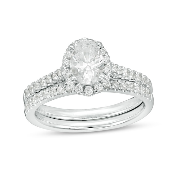 1-1/5 CT. T.w. Certified Oval Diamond Frame Bridal Set in 14K White Gold (I/Si2)