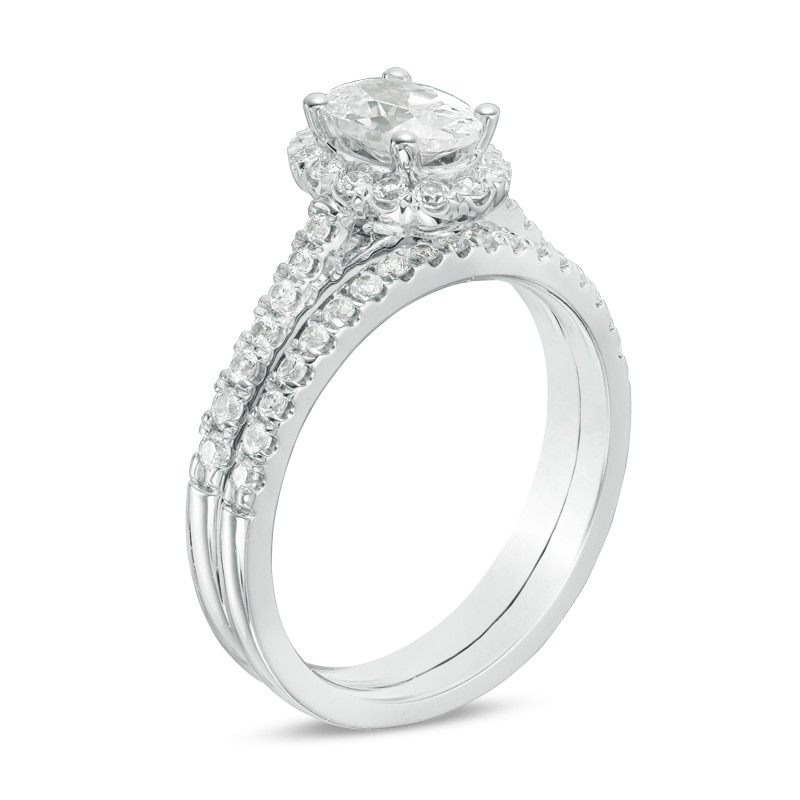Main Image 2 of 1-1/5 CT. T.W. Certified Oval Diamond Frame Bridal Set in 14K White Gold (I/SI2)