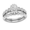 Thumbnail Image 1 of 1/2 CT. T.W. Oval Diamond Frame Bridal Set in 14K Gold