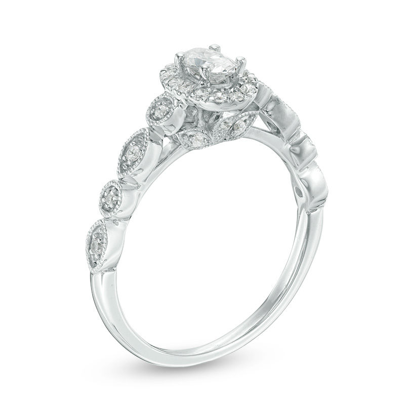 Main Image 3 of 1/2 CT. T.W. Oval Diamond Frame Bridal Set in 14K Gold