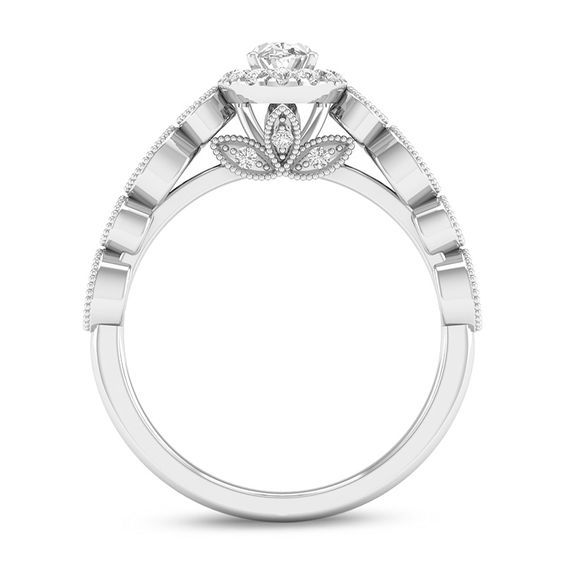 1/2 CT. T.w. Oval Diamond Frame Bridal Set in 14K Gold