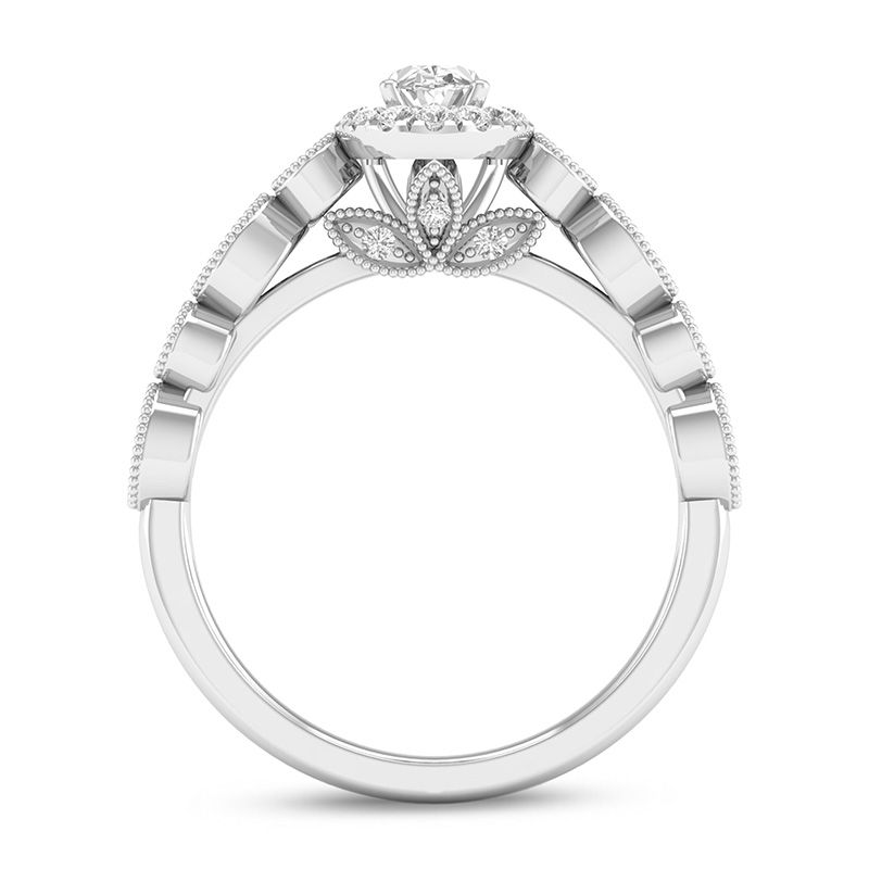 1/2 CT. T.W. Oval Diamond Frame Bridal Set in 14K Gold