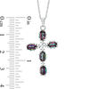 Thumbnail Image 1 of Oval Mystic Fire® Topaz and 1/20 CT. T.W. Diamond Cross Pendant in Sterling Silver