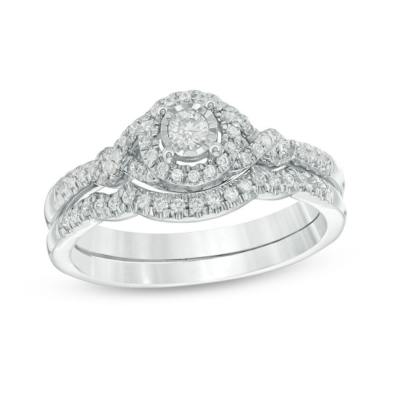 1/3 CT. T.W. Diamond Frame Twist Bridal Set in 10K White Gold