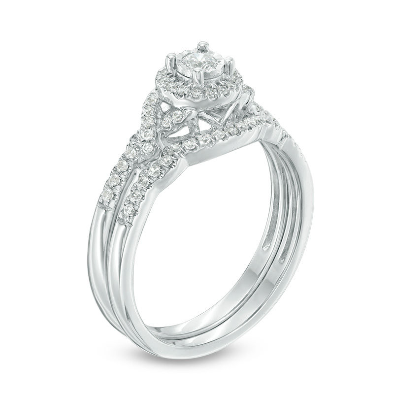 1/3 CT. T.W. Diamond Frame Twist Bridal Set in 10K White Gold