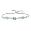 Thumbnail Image 1 of London and Swiss Blue Topaz with Lab-Created White Sapphire Frame Three Stone Bolo Bracelet in Sterling Silver - 9.0"