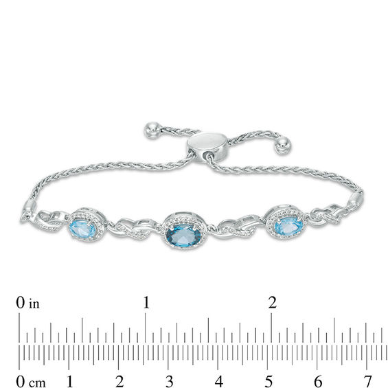 London and Swiss Blue Topaz with Lab-Created White Sapphire Frame Three Stone Bolo Bracelet in Sterling Silver - 9.0"