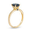 Thumbnail Image 2 of Oval Blue Sapphire and 1/20 CT. T.W. Diamond Ring in 14K Gold