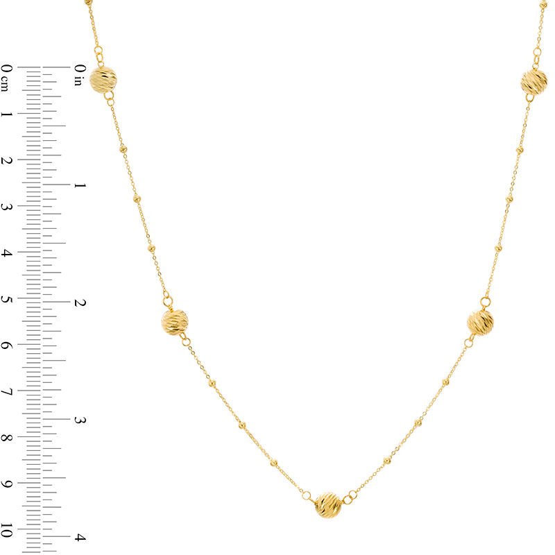 Main Image 3 of Diamond-Cut Ball and Bead Station Necklace in 10K Gold - 24"