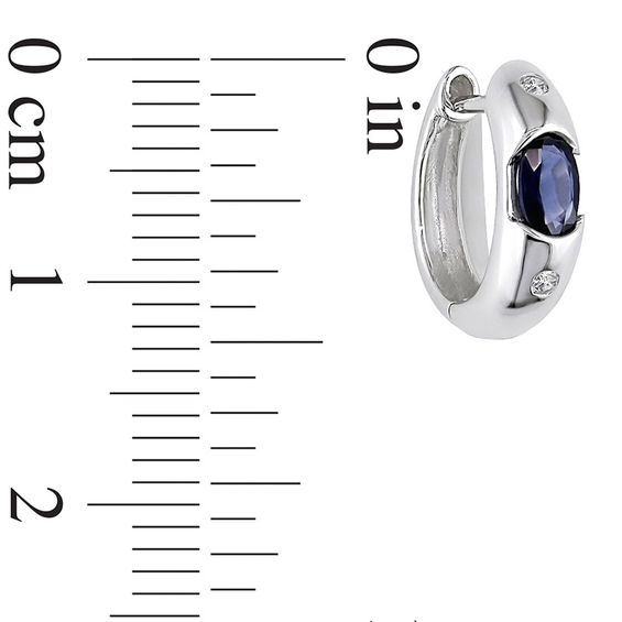 Oval Blue Sapphire and 1/20 CT. T.W. Diamond Huggie Hoop Earrings in 10K White Gold Oval Blue Sapphire and 1/20 CT. T.W. Diamond Huggie Hoop Earrings in 10K White Gold